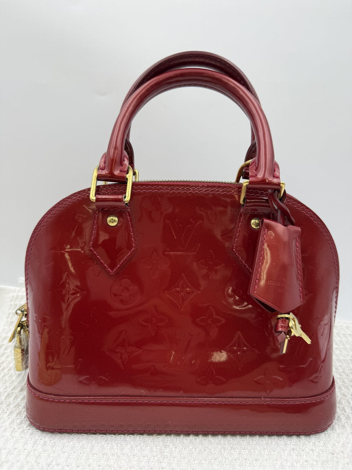 Louis Vuitton Alma BB - Red Monogram Vernis Leather front view