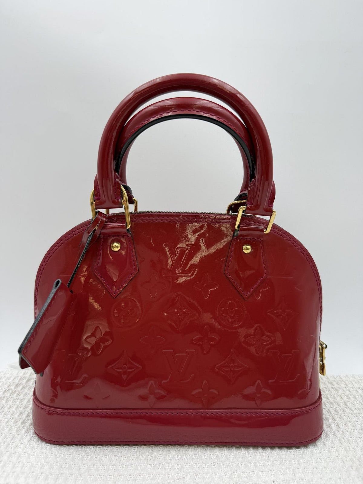 Louis Vuitton Alma BB - Red Monogram Vernis Leather front view