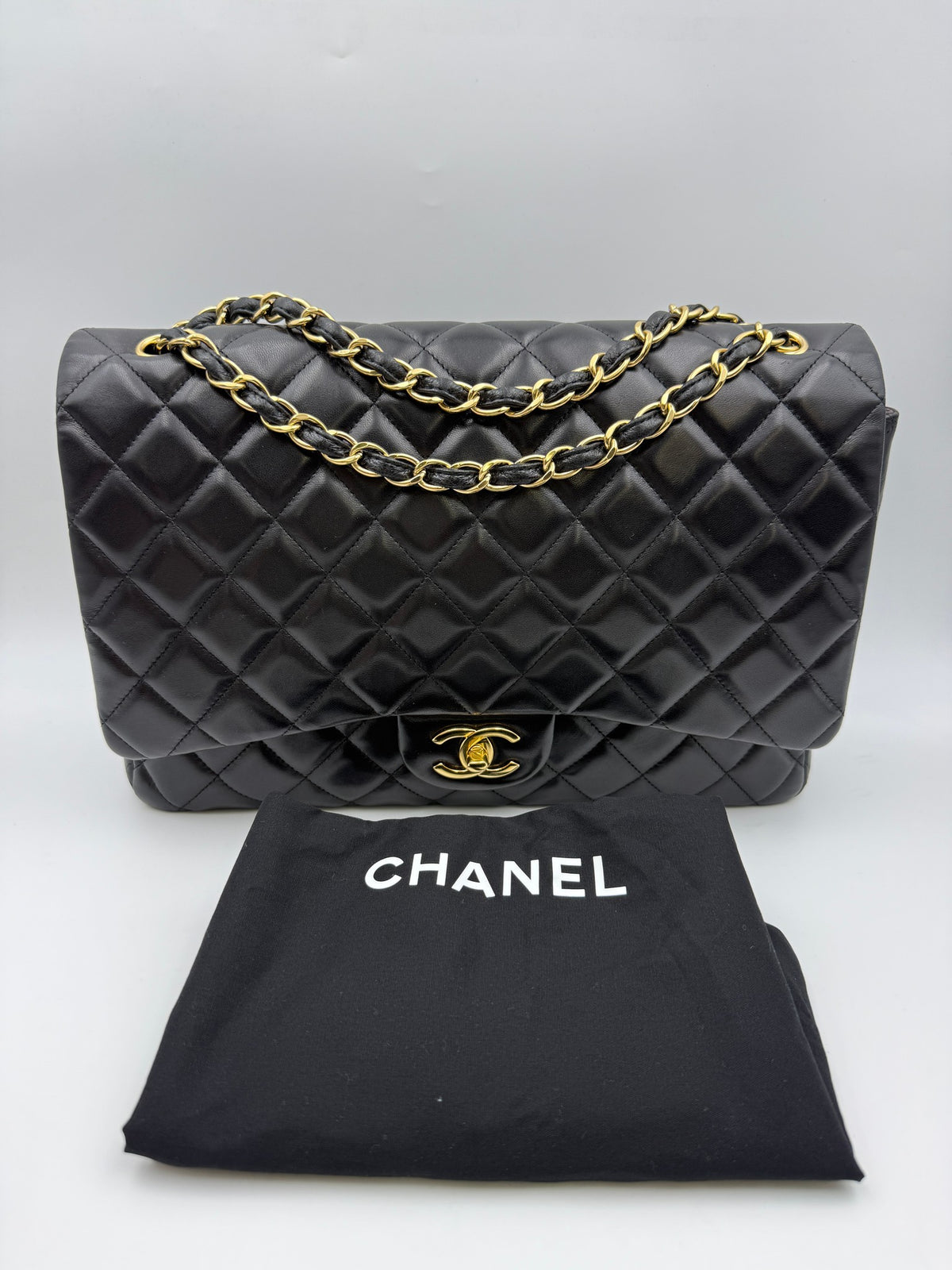 Chanel Classic Double Flap Bag, Black, stock 0257030 – front with dust bag