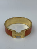 Hermes Clic H Orange Enamel Gold-Plated Bracelet - view 1 - item 0089020
