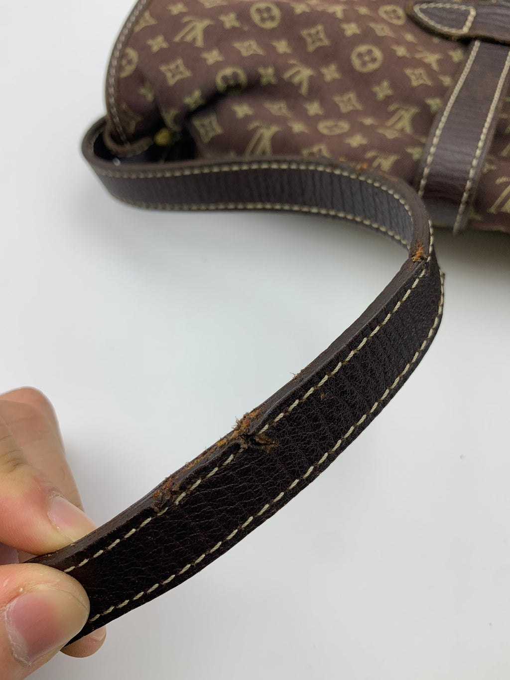 Louis Vuitton Mini Lin Saumur Shoulder Bag, Ebene brown, stock 1103035 – strap edge wear