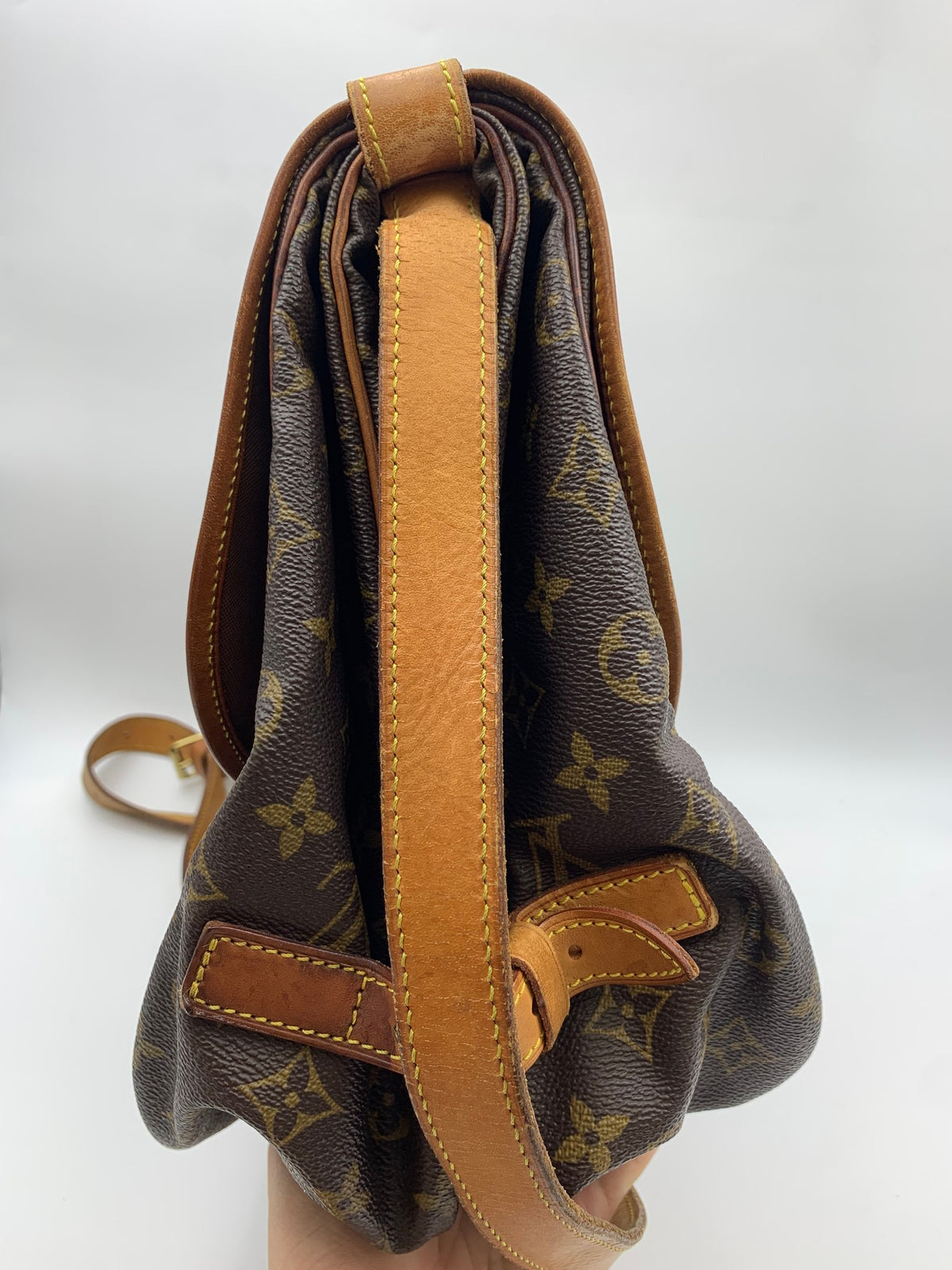 Louis Vuitton Saumur Shoulder Bag, Monogram brown, stock 1103034 – left side
