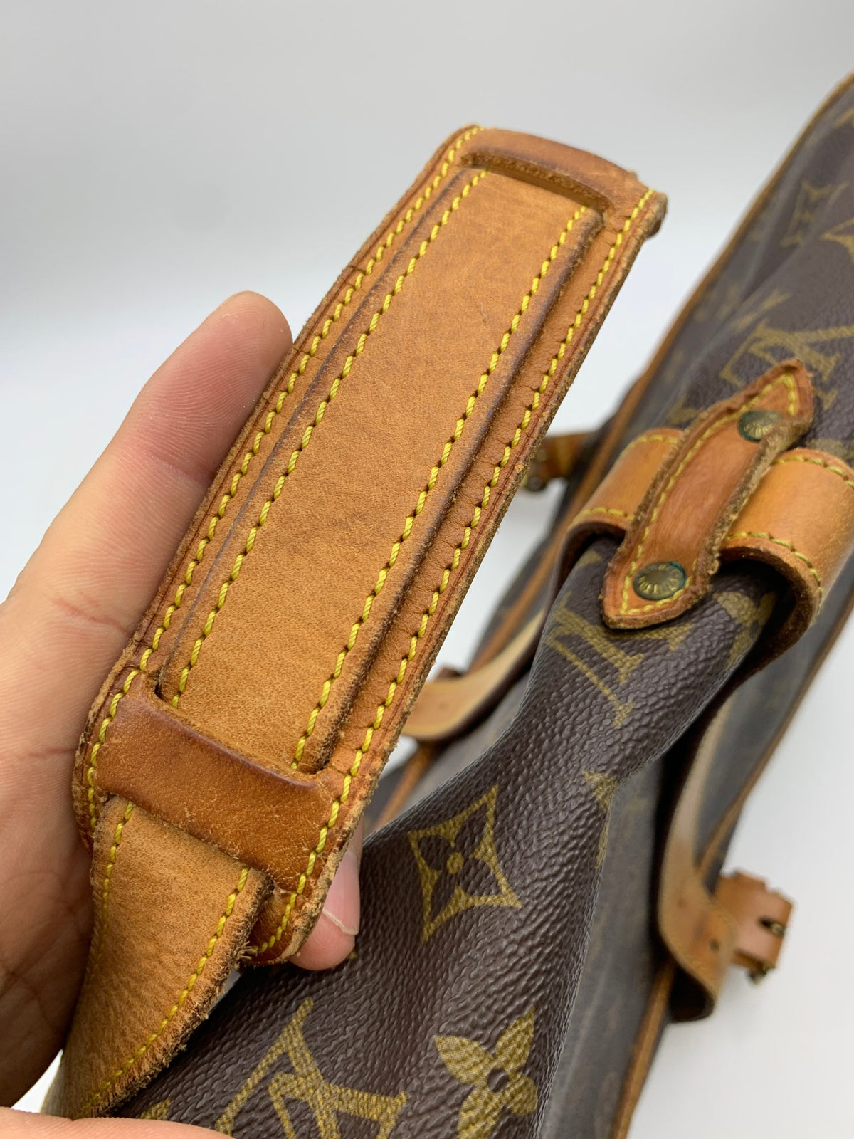 Louis Vuitton Saumur Shoulder Bag, Monogram brown, stock 1103034 – strap buckle