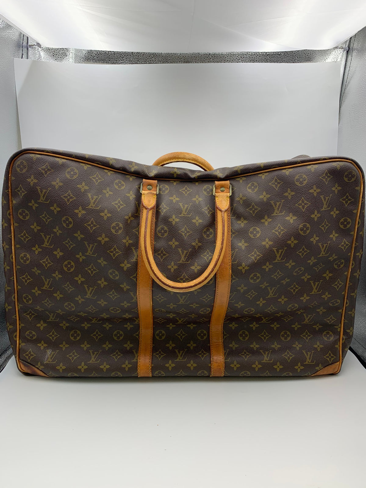 Louis Vuitton Sirius Travel Suitcase, Monogram brown, stock 1103031 – front