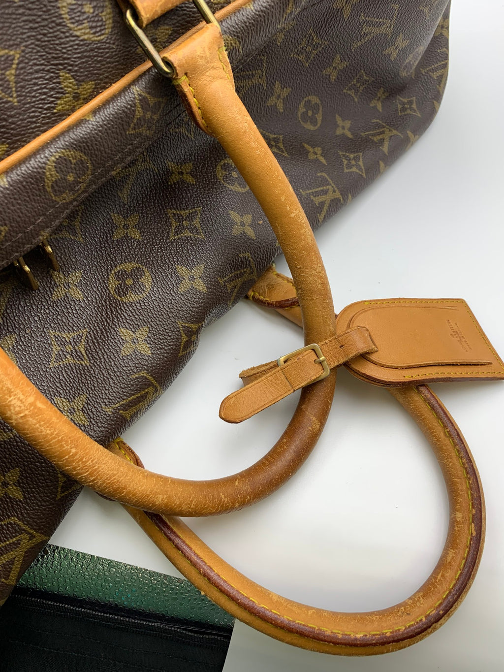 Louis Vuitton Sirius Travel Suitcase, Monogram brown, stock 1103031 – handles and luggage tag